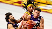 Minnesota Gophers forward Brandon Johnson (23) and Northwestern Wildcats forward Pete Nance (22) and guard Boo Buie (0) fight for the ball during the first half Feb 25, 2021; Minneapolis, Minnesota, USA;  at Williams Arena. Mandatory Credit: Harrison Barden-Imagn Images