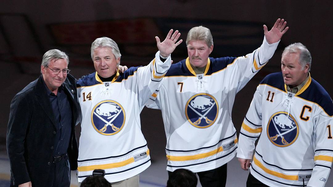The Buffalo Sabres' French Connection (Rene Robert , Rick Martin and Gilbert Perreault) with team owner Terry Pegula