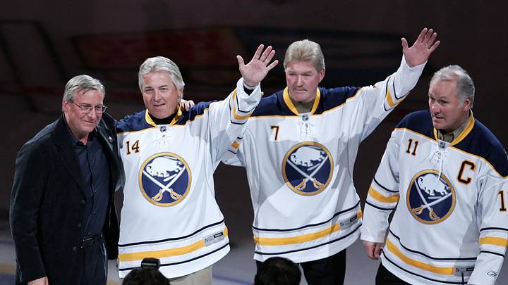 The Buffalo Sabres' French Connection (Rene Robert , Rick Martin and Gilbert Perreault) with team owner Terry Pegula