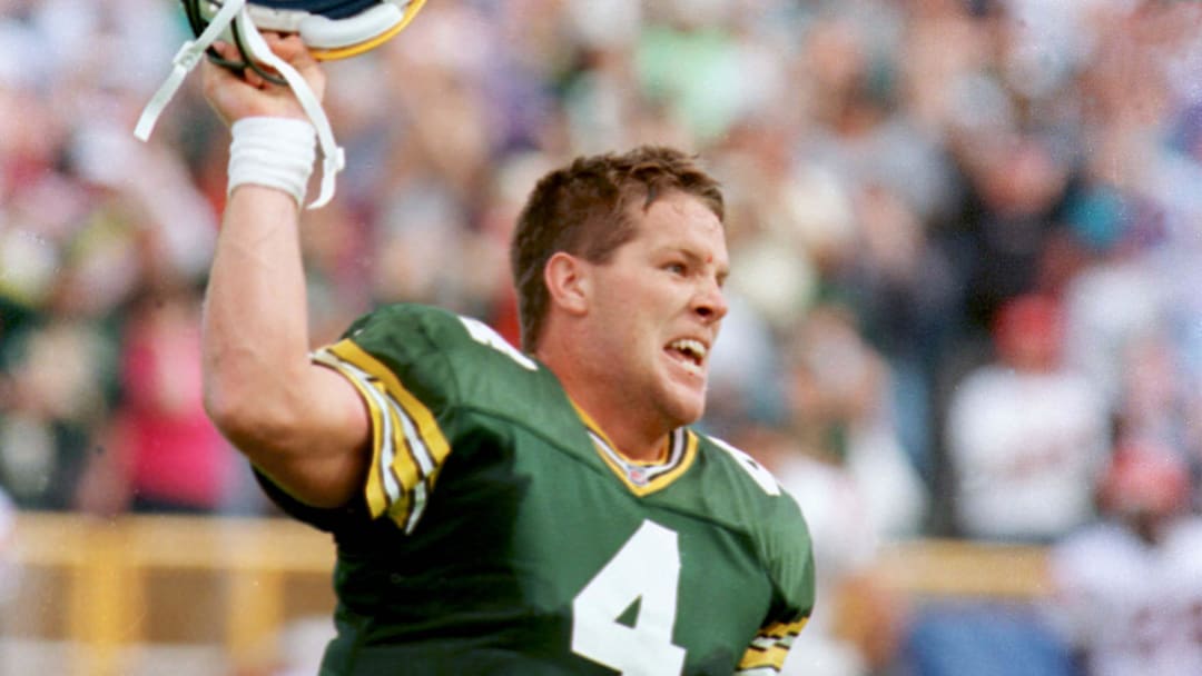 Brett Favre celebrates after the Green Bay Packers 24-23 victory over Cincinnati on Sept. 20, 1992
