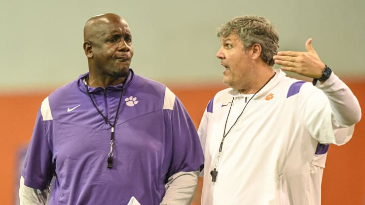 Feb 28, 2024; Clemson, South Carolina, USA; Clemson defensive tackles Coordinator Nick Eason and  offensive line coach Matt Luke during the first day of Spring practice at Poe Indoor Practice Facility at the Allen N. Reeves football complex. Mandatory Credit: Ken Ruinard-USA TODAY Sports