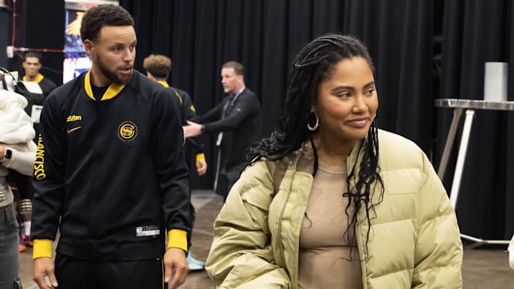Golden State Warriors guard Stephen Curry (30) with wife Ayesha Curry prior to the game against the Phoenix Suns at Footprint Center.