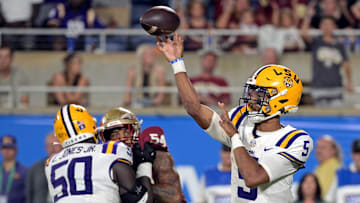 Sep 3, 2023; Orlando, Florida, USA; LSU Tigers quarterback Jayden Daniels (5) throws the ball during the fourth quarter against the Florida State Seminoles at Camping World Stadium. Mandatory Credit: Melina Myers-USA TODAY Sports