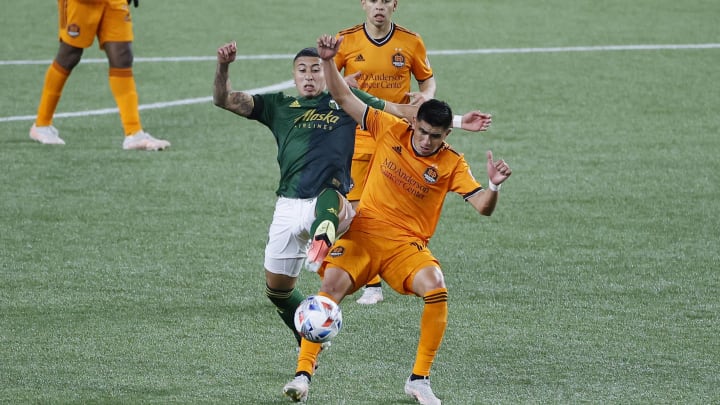 Apr 24, 2021; Portland, Oregon, USA; Portland Timbers midfielder Marvin Lor a (44) and Houston