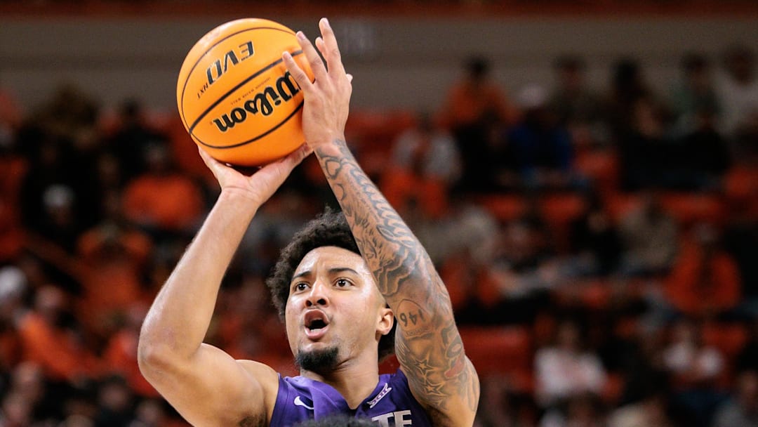 Kansas State's  P.J. Haggerty shoots the ball over Oklahoma State's Vyctorius Miller during the second half at Gallagher-Iba Arena. 
