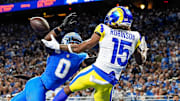 Detroit Lions CB Terrion Arnold (0) tries to block a pass intended for former Rams WR Demarcus Robinson (15). 