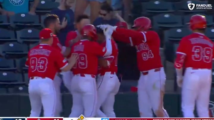 Los Angeles Angels players celebrate after a walk-off win vs. the Seattle Mariners in a spring training contest on Feb. 22, 2025. Los Angeles Angels players celebrate after a walk-off win vs. the Seattle Mariners in a spring training contest on Feb. 22, 2025.