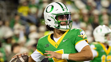 Oregon quarterback Dante Moore throws a pass before the game as the Oregon Ducks host the Minnesota Golden Gophers on Nov. 14, 2025, at Autzen Stadium in Eugene, Oregon.