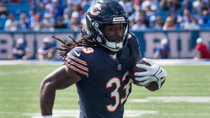 Chicago Bears running back Ian Wheeler (33) runs for a touchdown in the fourth quarter of a pre-season game against the Buffalo Bills.