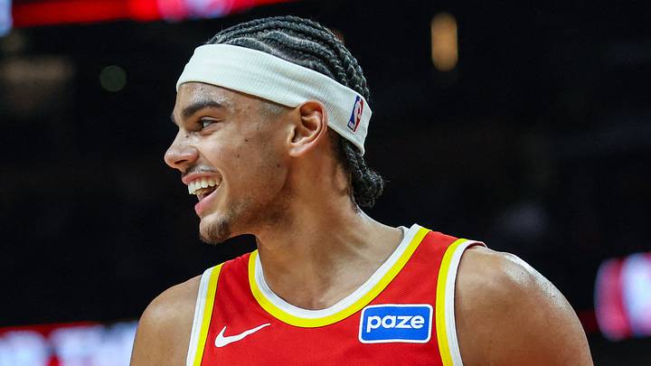 Atlanta Hawks forward Asa Newell (14) reacts in the game against the Chicago Bulls during the third quarter at State Farm Arena on December 23, 2025.