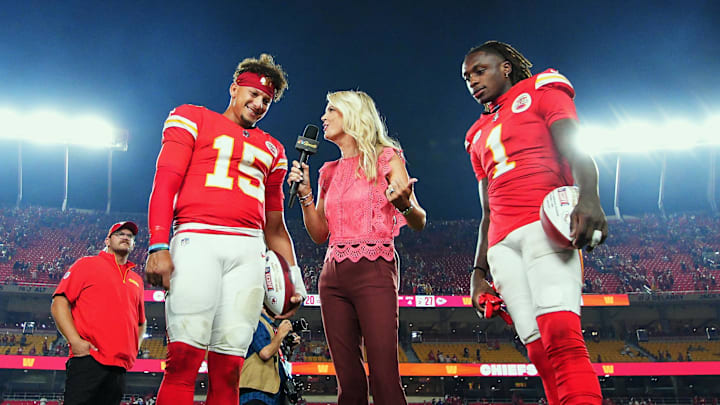 Sep 5, 2024; Kansas City, Missouri, USA; Kansas City Chiefs quarterback Patrick Mahomes (15) and wide receiver Xavier Worthy (1) talk with reporter Melissa Stark after defeating the Baltimore Ravens at GEHA Field at Arrowhead Stadium. Mandatory Credit: Jay Biggerstaff-Imagn Images