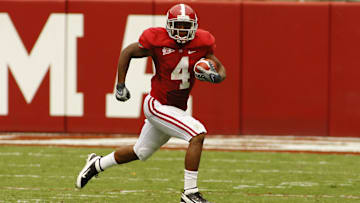 September 3, 2011; Tuscaloosa, AL, USA;  Alabama Crimson Tide wide receiver Marquis Maze (4) carries against the Kent State Golden Flashes during the first half at Bryant Denny Stadium.  Mandatory Credit: John David Mercer-Imagn Images
