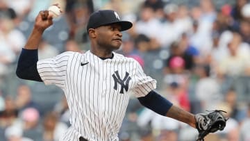 Jul 25, 2023; Bronx, New York, USA; New York Yankees starting pitcher Domingo German (0) delivers a pitch during the first inning against the New York Mets at Yankee Stadium. Mandatory Credit: Vincent Carchietta-USA TODAY Sports