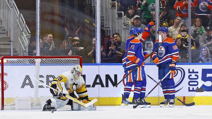 The Edmonton Oilers celebrate a goal scored