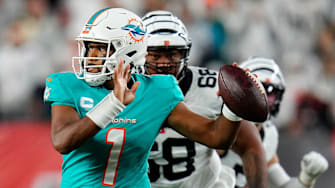 Miami Dolphins quarterback Tua Tagovailoa (1) is pursued by Cincinnati Bengals defensive tackle Josh Tupou (68) in the second quarter of the NFL Week 4 game between the Cincinnati Bengals and the Miami Dolphins at PayCor Stadium in downtown on Thursday, Sept. 29, 2022. The Bengals 14-12 at halftime.

Miami Dolphins At Cincinnati Bengals Week 4