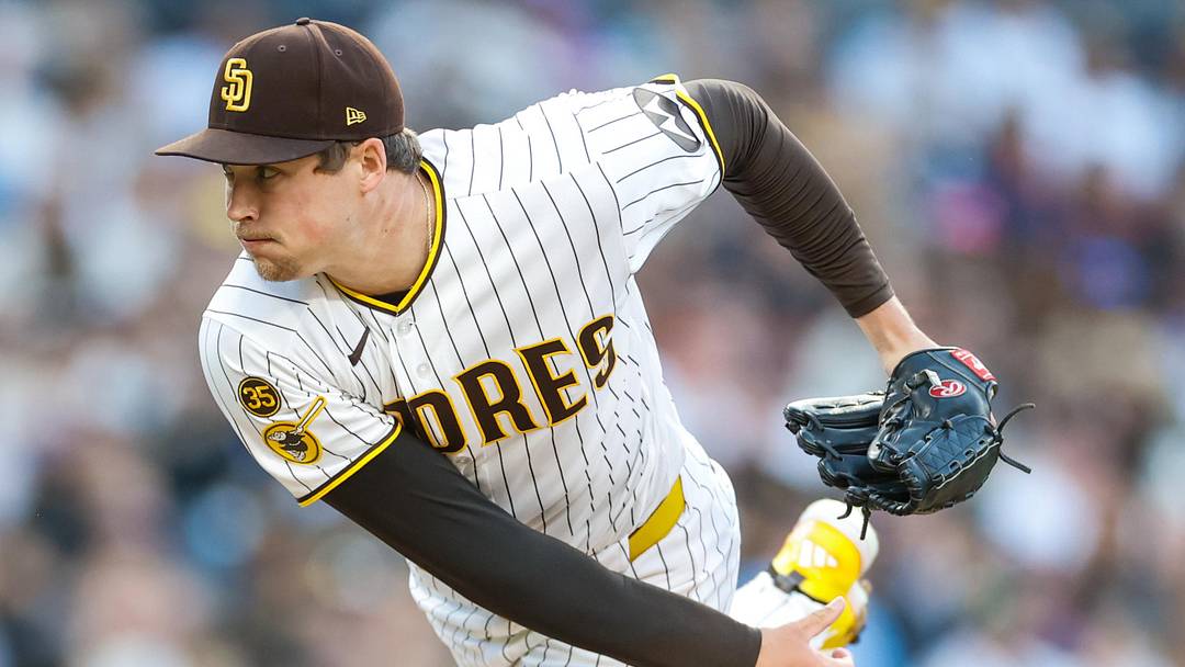 May 9, 2026; San Diego, California, USA; San Diego Padres relief pitcher Mason Miller (22) throws a pitch during the eighth inning against the St. Louis Cardinals at Petco Park. Mandatory Credit: David Frerker-Imagn Images