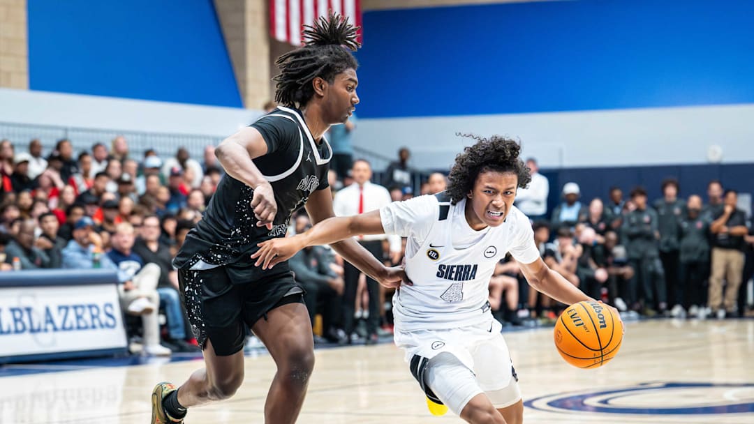 Sierra Canyon's JJ Sati-Grier drives to the basket against Harvard-Westlake in the CIF State Open Division regional final. Sierra Canyon's JJ Sati-Grier drives to the basket against Harvard-Westlake in the CIF State Open Division regional final.