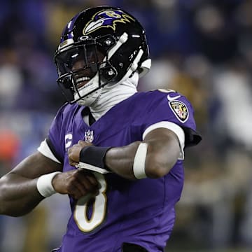Jan 11, 2025; Baltimore, Maryland, USA; Baltimore Ravens quarterback Lamar Jackson (8) warms up before an AFC wild card game against the Pittsburgh Steelers at M&T Bank Stadium. Mandatory Credit: Geoff Burke-Imagn Images