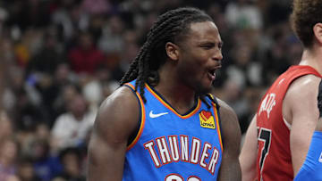 Dec 5, 2024; Toronto, Ontario, CAN; Oklahoma City Thunder guard Cason Wallace (22) reacts after making a basket against the Toronto Raptors during the second half at Scotiabank Arena. Mandatory Credit: John E. Sokolowski-Imagn Images