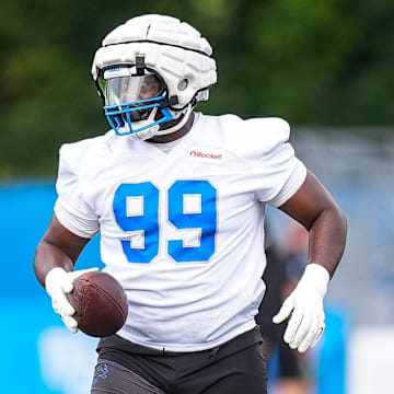Detroit Lions defensive tackle Brodric Martin (99) practices during training camp at Meijer Performance Center in Allen Park on Sunday, July 20, 2025.