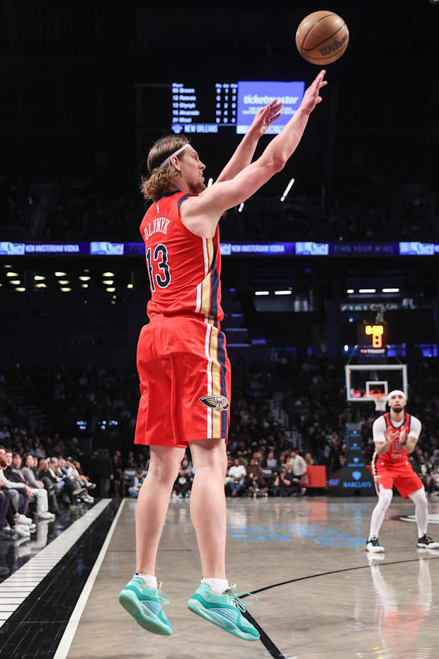 New Orleans Pelicans forward Kelly Olynyk (13) takes a three point shot in the third quarter against the Brooklyn Nets at Bar