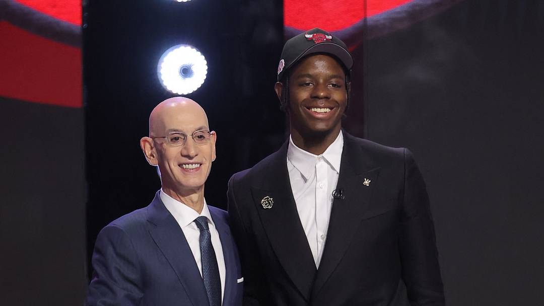 Jun 23, 2026; New York, NY, USA; NBA commissioner Adam Silver greets the fourth pick in the 2026 NBA draft, North Carolina forward Caleb Wilson after he was selected by the Chicago Bulls at Barclays Center. Mandatory Credit: Brad Penner-Imagn Images Jun 23, 2026; New York, NY, USA; NBA commissioner Adam Silver greets the fourth pick in the 2026 NBA draft, North Carolina forward Caleb Wilson after he was selected by the Chicago Bulls at Barclays Center. Mandatory Credit: Brad Penner-Imagn Images
