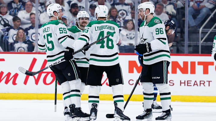 May 7, 2025; Winnipeg, Manitoba, CAN; Dallas Stars forward Mikko Rantanen (96) is congratulated by his team mates on his goal against the Winnipeg Jets during the second period in game one of the second round of the 2025 Stanley Cup Playoffs at Canada Life Centre. Mandatory Credit: Terrence Lee-Imagn Images