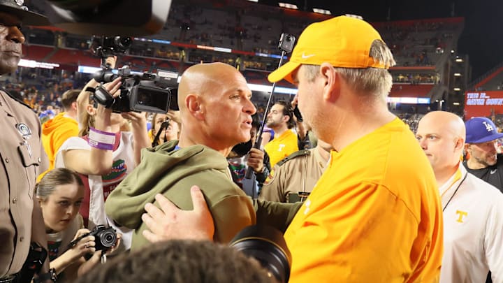 Florida Interim Head Coach Billy Gonzales meets Tennessee head coach Josh Heupel midfield after an NCAA football game against Tennessee at Steve Spurrier Field at Ben Hill Griffin Stadium in Gainesville, FL on Saturday, November 22, 2025. Florida lost to Tennessee 31-11[Alan Youngblood/Gainesville Sun]