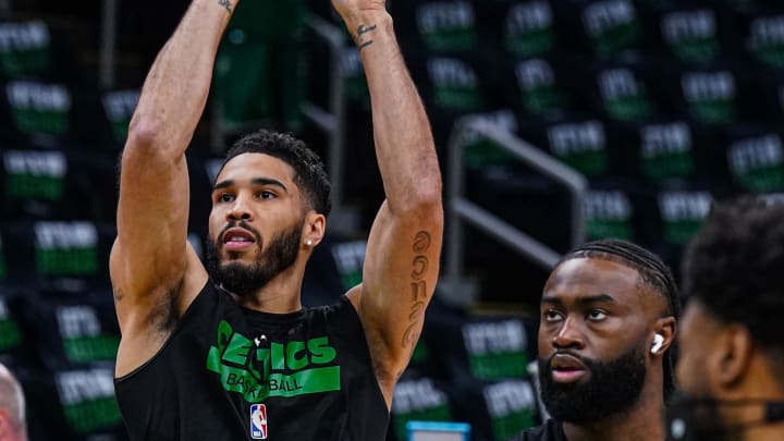 May 21, 2024; Boston, Massachusetts, USA; Boston Celtics forward Jayson Tatum (0) and guard Jaylen Brown (7) warm up before the start of game one of the eastern conference finals for the 2024 NBA playoffs against the Indiana Pacers at TD Garden. Mandatory Credit: David Butler II-USA TODAY Sports