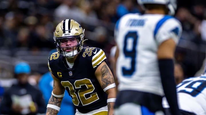 Dec 10, 2023; New Orleans, Louisiana, USA; New Orleans Saints safety Tyrann Mathieu (32) stares down Carolina Panthers quarterback Bryce Young (9) during the first half at the Caesars Superdome. Mandatory Credit: Stephen Lew-USA TODAY Sports