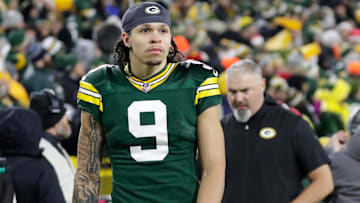 Green Bay Packers wide receiver Christian Watson (9) leaves the field in the fourth quarter at Lambeau Field.