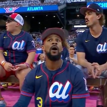 Minnesota Twins' Byron Buxton reacts to James Wood hitting a home run at the HR Derby.