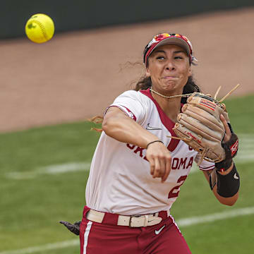 Oklahoma infielder Nelly McEnroe-Marinas throws after fielding a ground ball against LSU at Jack Turner Stadium.