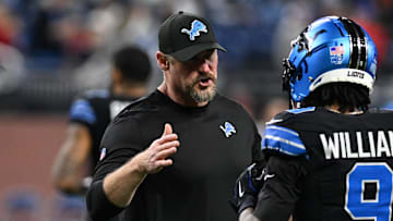 Dec 15, 2024; Detroit, Michigan, USA; Detroit Lions head coach Dan Campbell greets wide receiver Jameson Williams (9) during pregame warmups before their game against the Buffalo Bills at Ford Field. Mandatory Credit: Lon Horwedel-Imagn Images