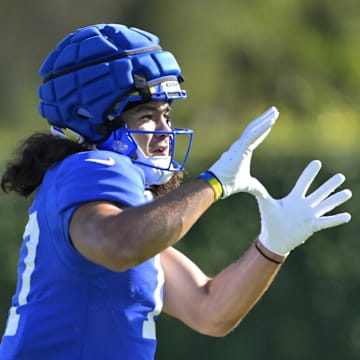 Jul 29, 2024; Los Angeles, CA, USA;  Los Angeles Rams wide receiver Puka Nacua (17) catches a pass during training camp at Loyola Marymount University. Mandatory Credit: Jayne Kamin-Oncea-Imagn Images