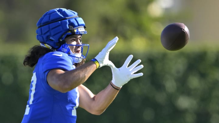 Jul 29, 2024; Los Angeles, CA, USA;  Los Angeles Rams wide receiver Puka Nacua (17) catches a pass during training camp at Loyola Marymount University. Mandatory Credit: Jayne Kamin-Oncea-USA TODAY Sports