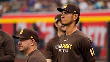 Jun 14, 2025; Phoenix, Arizona, USA; San Diego Padres pitcher Yu Darvish (11) watches before the start a game against the Arizona Diamondbacks at Chase Field. Mandatory Credit: Allan Henry-Imagn Images