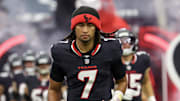 Aug 16, 2025; Houston, Texas, USA; Houston Texans quarterback C.J. Stroud (7) runs out of the tunnel onto the field before playing against the Carolina Panthers at NRG Stadium. Mandatory Credit: Thomas Shea-Imagn Images