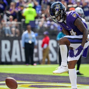 Sep 15, 2024; Baltimore, Maryland, USA; Baltimore Ravens wide receiver Zay Flowers (4) celebrates after scoring a touchdown during the second half against the Las Vegas Raiders at M&T Bank Stadium. Mandatory Credit: Reggie Hildred-Imagn Images