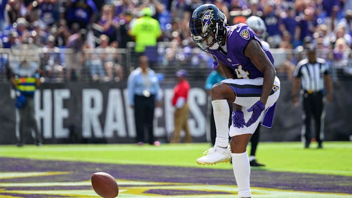 Sep 15, 2024; Baltimore, Maryland, USA; Baltimore Ravens wide receiver Zay Flowers (4) celebrates after scoring a touchdown during the second half against the Las Vegas Raiders at M&T Bank Stadium. Mandatory Credit: Reggie Hildred-Imagn Images