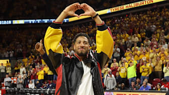 Mar 1, 2025; Ames, Iowa, USA;  Former Iowa State Cyclones and current USA Olympic Gold Medalist Tyrese Haliburton is celebrated during half-time of their game with the Arizona Wildcats at James H. Hilton Coliseum. Mandatory Credit: Reese Strickland-Imagn Images