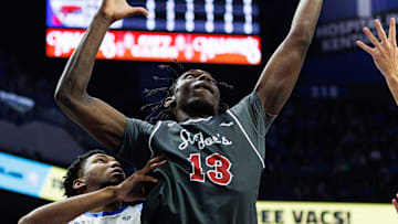 Nov 20, 2023; Lexington, Kentucky, USA; Saint Joseph's Hawks forward Rasheer Fleming (13) reaches for a rebound during the first half against the Kentucky Wildcats at Rupp Arena at Central Bank Center. Mandatory Credit: Jordan Prather-Imagn Images