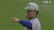 New York Mets right fielder Juan Soto points to Yankees fans.