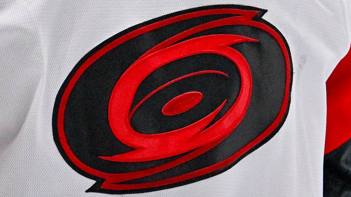 Oct 25, 2025; Dallas, Texas, USA; A view of the logo on the jersey of Carolina Hurricanes goaltender Brandon Bussi (32) during the game between the Stars and the Hurricanes at the American Airlines Center. Oct 25, 2025; Dallas, Texas, USA; A view of the logo on the jersey of Carolina Hurricanes goaltender Brandon Bussi (32) during the game between the Stars and the Hurricanes at the American Airlines Center.