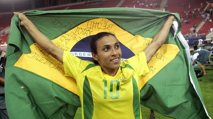 Brazilian forward Marta carries her nati