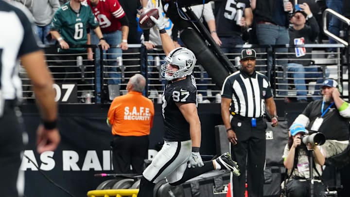 Dec 14, 2023; Paradise, Nevada, USA; Las Vegas Raiders tight end Michael Mayer (87) celebrates as he scores a touchdown in the second quarter against the Los Angeles Chargers at Allegiant Stadium. Mandatory Credit: Stephen R. Sylvanie-Imagn Images Dec 14, 2023; Paradise, Nevada, USA; Las Vegas Raiders tight end Michael Mayer (87) celebrates as he scores a touchdown in the second quarter against the Los Angeles Chargers at Allegiant Stadium. Mandatory Credit: Stephen R. Sylvanie-Imagn Images