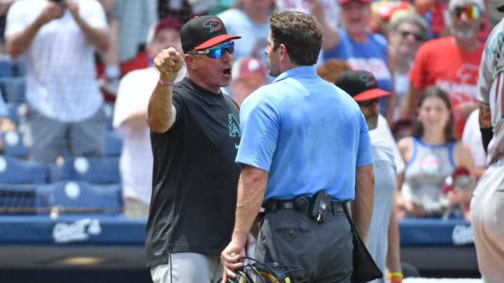 Jun 23, 2024; Philadelphia, Pennsylvania, USA; Arizona Diamondbacks bench coach Jeff Banister (82) argues with umpire Ben May (97) after being ejected during the sixth inning against the Philadelphia Phillies at Citizens Bank Park. Mandatory Credit: Eric Hartline-USA TODAY Sports