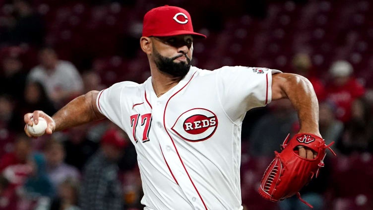 Cincinnati Reds relief pitcher Art Warren (77) throws a pitch.