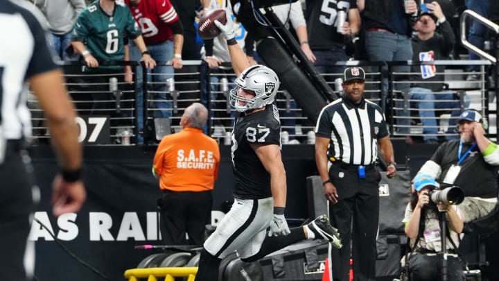 Dec 14, 2023; Paradise, Nevada, USA; Las Vegas Raiders tight end Michael Mayer (87) celebrates as he scores a touchdown in the second quarter against the Los Angeles Chargers at Allegiant Stadium. Mandatory Credit: Stephen R. Sylvanie-USA TODAY Sports