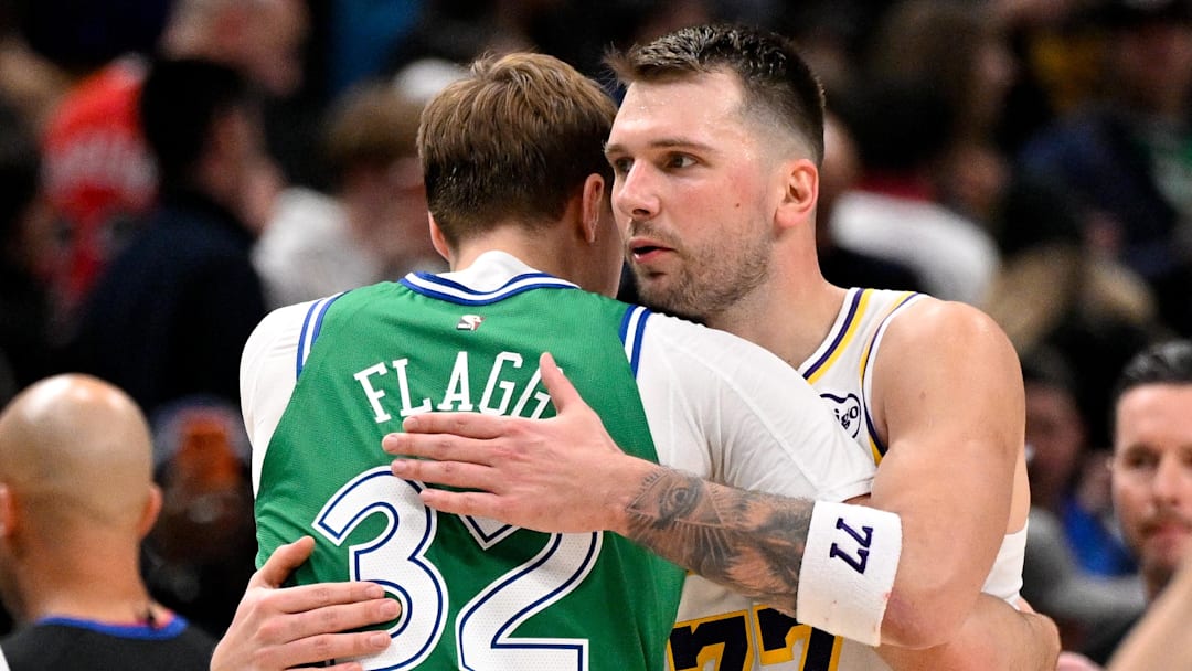Jan 24, 2026; Dallas, Texas, USA; Dallas Mavericks forward Cooper Flagg (32) hugs Los Angeles Lakers guard Luka Doncic (77) after the game at the American Airlines Center. Mandatory Credit: Jerome Miron-Imagn Images